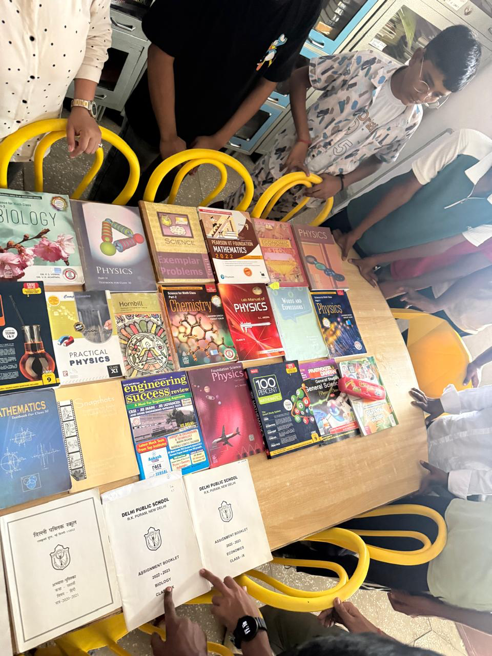 Donation of text books and study material for high school students to a students hostel